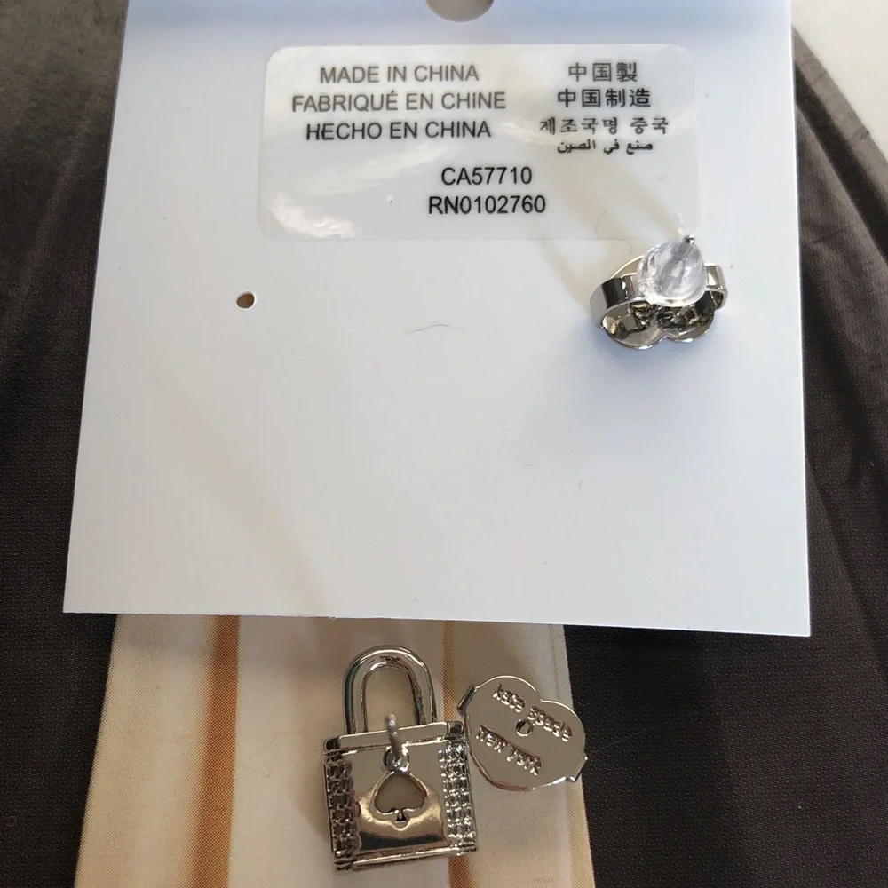 Authentic New on card Kate spade silver crystal lock earrings